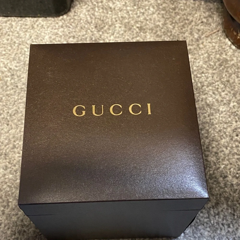 Gucci Silver Timepiece with Multicolor Strap